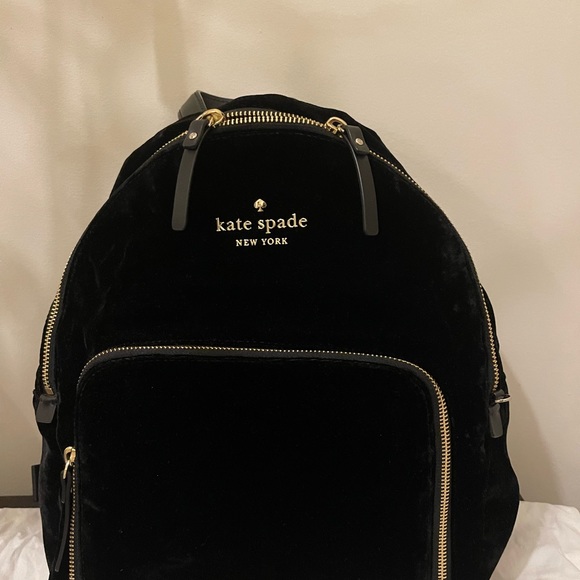kate spade Handbags - Medium size Kate Spade backpack in black Velvet with gold zipper.